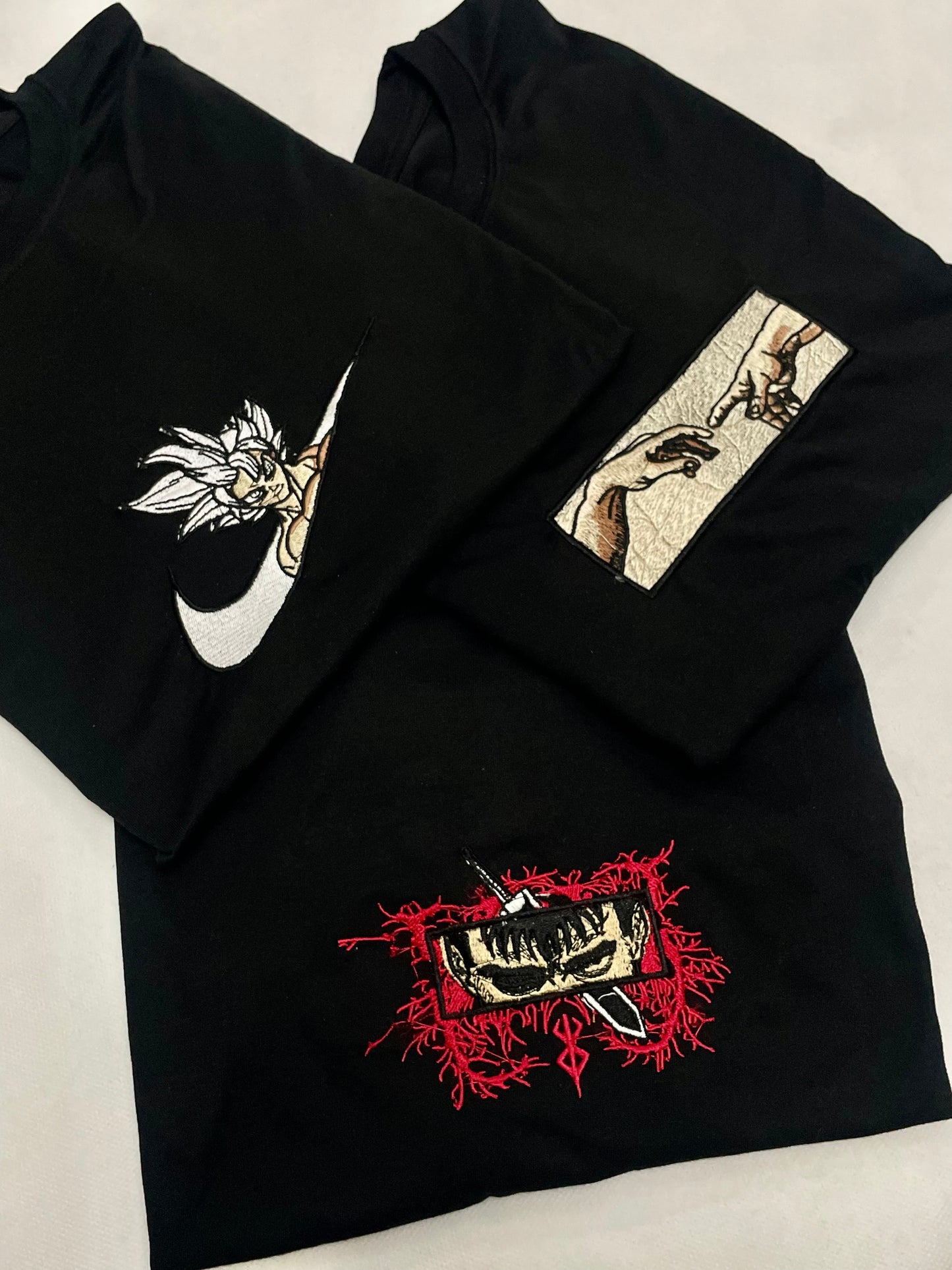 Berserk Eyes , Creation of Adam & Goku x Nike 3-Pack Tee